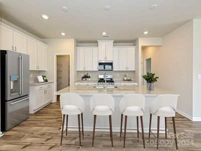 Photo is not of the actual home but is an inspirational photo of builder’s model home and may depict options, furnishings, and/or decorator features that are not included. | Image 3