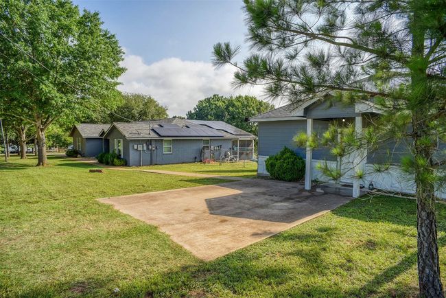 Guest house front yard, located next to the main house. | Image 6