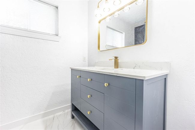 Primary bathroom. | Image 11