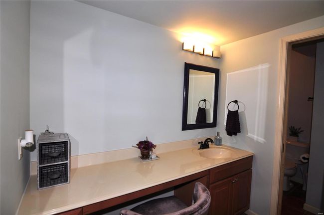 Basement bathroom vanity area. | Image 30
