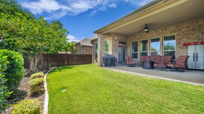 View of backyard with covered patio | Image 23