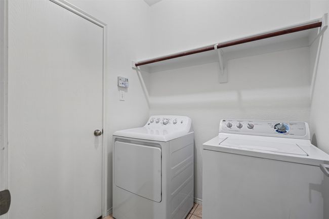 Laundry area featuring washer and dryer | Image 30