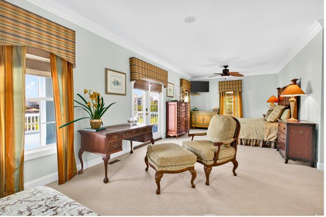 Carpeted bedroom with ornamental molding, access to exterior, french doors, and ceiling fan | Image 23
