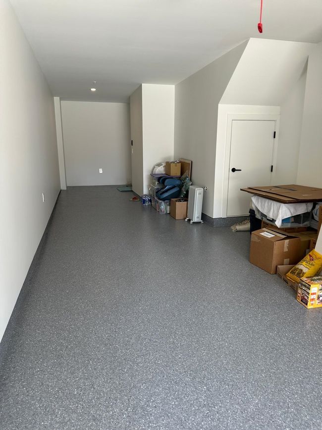 Bonus room with speckled floor | Image 12