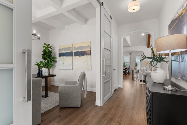 Tall ceilings, light and bright walls, coffered ceiling in the study, and a fabulous view into the rest of the home. | Image 6