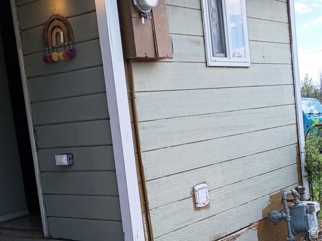 Exterior view of gas meter and electric meter | Image 55