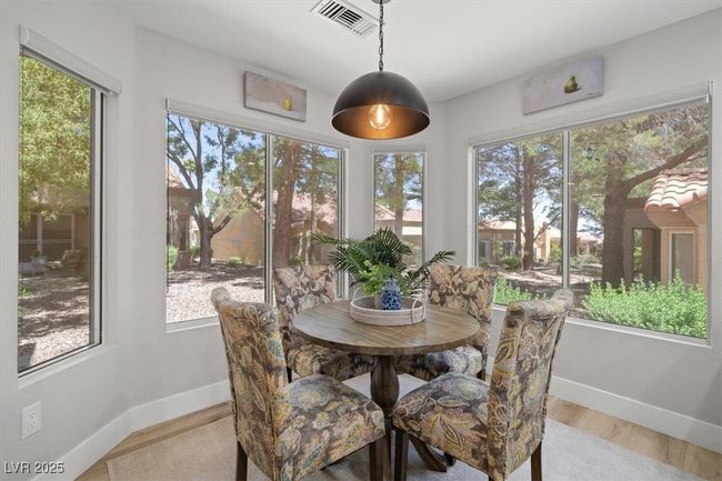 The gourmet chef’s kitchen is a masterpiece with quartz countertops, a touch-activated faucet, new sink, custom cabinetry, & premium stainless steel appliances. | Image 16