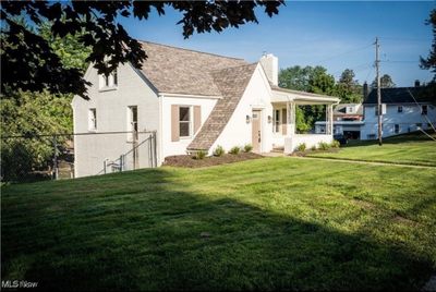 Rear view of property with a lawn | Image 2