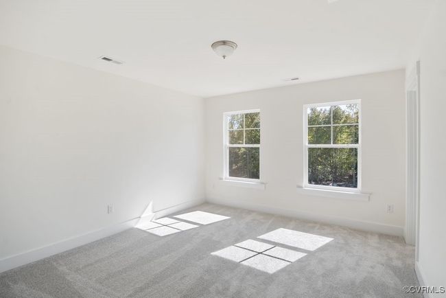 Photo represents the plan, not the actual home. Design selections may vary. Bedrooms 2 and 3 with walk-in closet. Bedroom 4 with double door closet. | Image 30