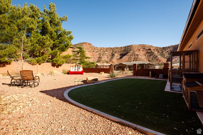 View of yard with a fenced backyard and a mountain view | Image 37