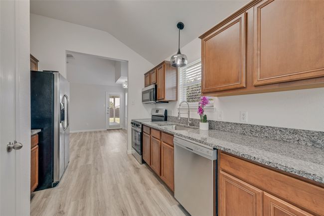 New stainless appliances, granite countertops, new sink and faucet | Image 12
