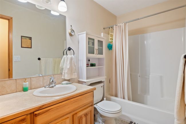 Full bathroom with vanity and shower / tub combo | Image 36