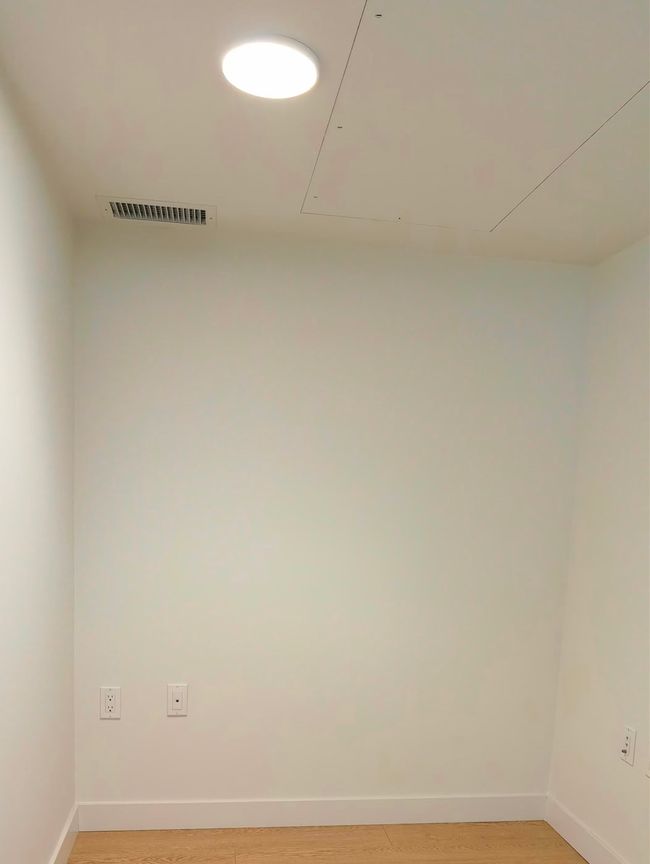 Unfurnished room featuring light wood-style floors and baseboards | Image 13