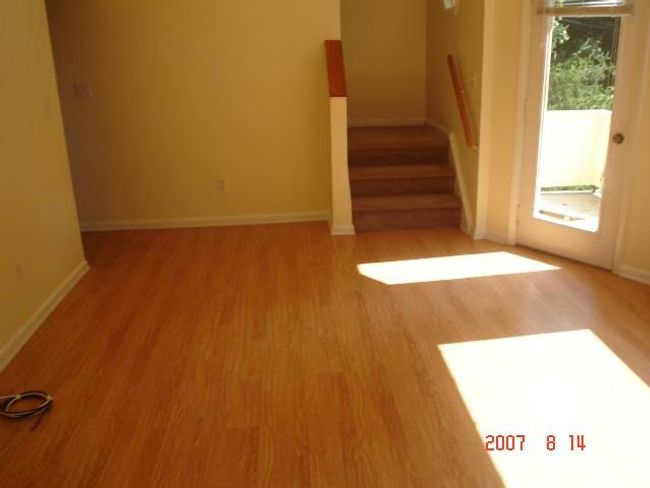 2nd Fl Staircase featuring hardwood / wood-style floors | Image 7