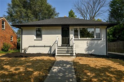 Bungalow-style house featuring a front yard | Image 1