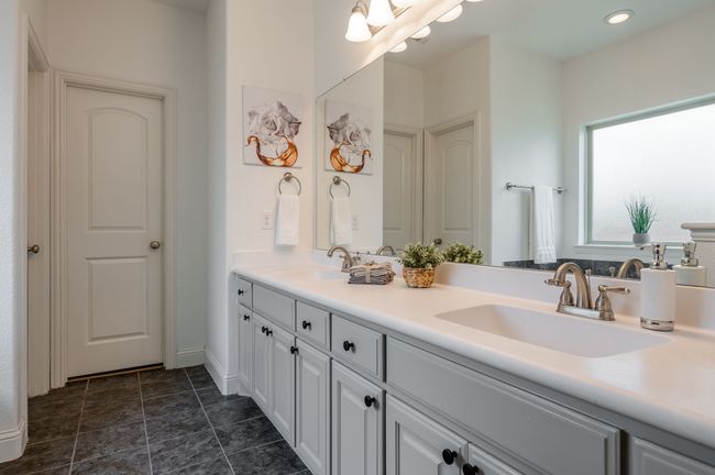 Bathroom with double vanity and recessed lighting | Image 14
