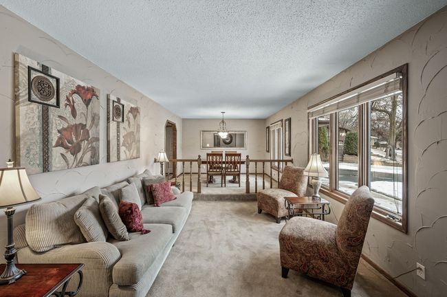A nice formal living room & dining room option just off the foyer - | Image 9