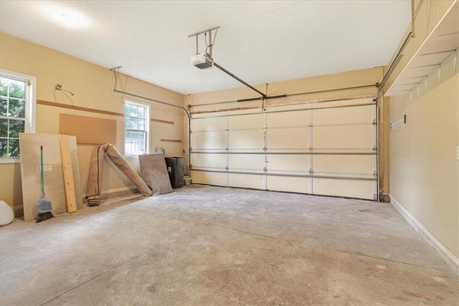 Garage with a garage door opener | Image 33