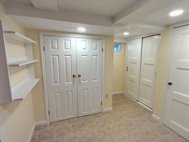 Foyer featuring baseboards, light tile patterned flooring, and recessed lighting | Image 34