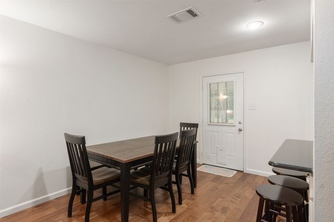 Dining room featuring wood finished floors and is right off the kitchen. | Image 10