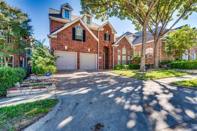 View of front of home featuring a garage | Image 1