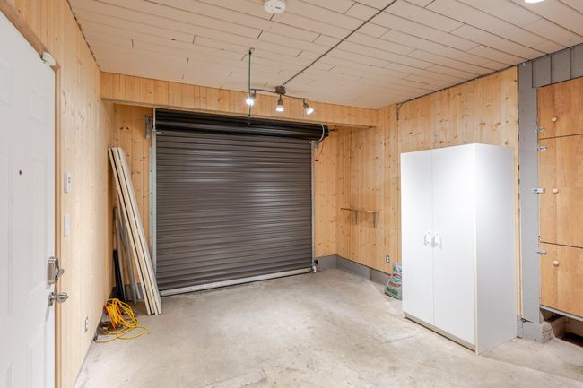 Garage with wood walls | Image 36