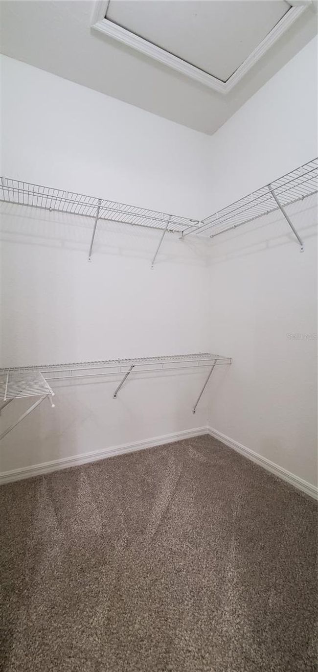 Walk-in closets in both bedrooms | Image 10