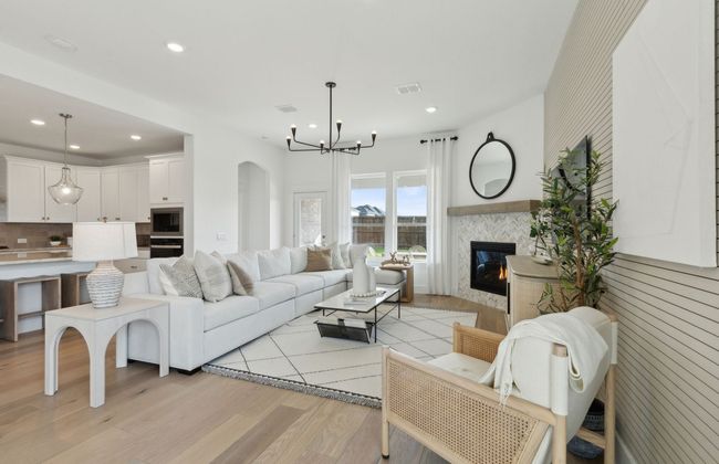Spacious gathering room *Photos of furnished model. Not actual home. Representative of floor plan. Some options and features may vary | Image 10