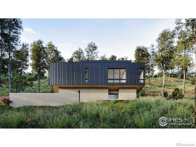 A facade of exposed architectural concrete and fire-resistant standing-seam steel siding creates a striking juxtaposition with the surrounding landscape, while a long driveway and attached two-car garage add abundant parking to this hillside Boulder beauty | Image 3