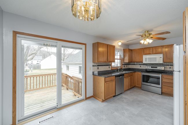 Bright kitchen and dining area | Image 9