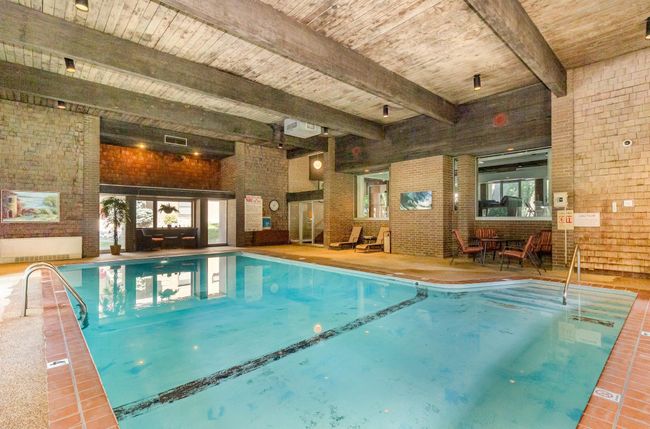 Beautiful indoor pool and swimming area. | Image 16
