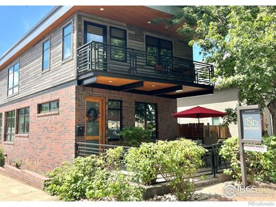 Front of home. Custom brick blend surrounds all 4 sides of the home, High quality wood siding. | Image 1