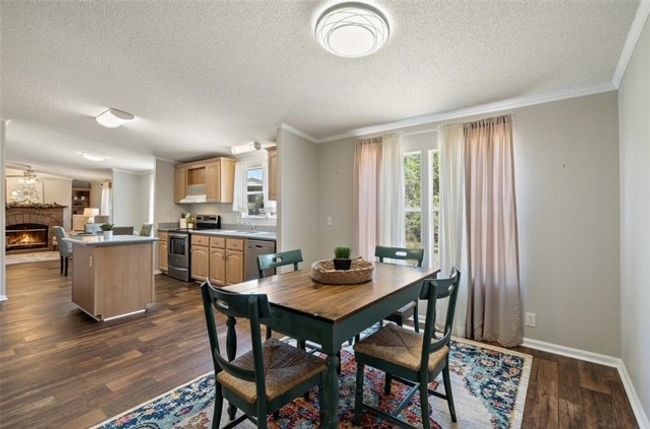 Dining room connected directly off the living room and kitchen | Image 19