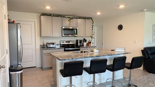 7530 Broad Pointe Dr, House other with 5 bedrooms, 3 bathrooms and null parking in Zephyrhills FL | Image 5