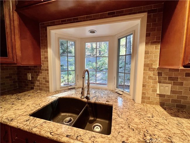 Kitchen sink with bay window. | Image 12