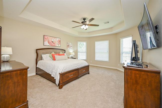Privacy is key in a primary suite, providing tranquil and secluded space to unwind and recharge. | Image 19