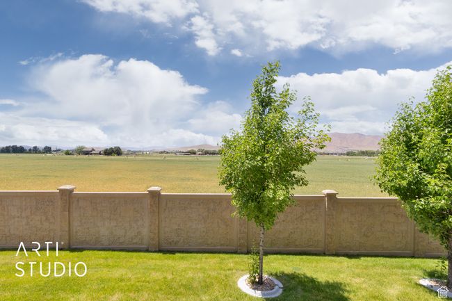 View of yard featuring a rural view and a mountain view | Image 35