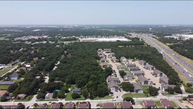 Aerial overview of property's location with a main thoroughfare | Image 5