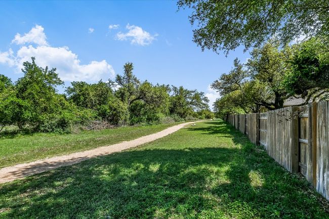 Surrounding community featuring fence and a lawn | Image 30