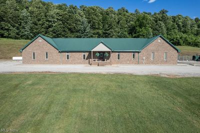 View of front of house featuring a front lawn | Image 1