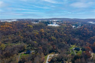 Rare opportunity to own this magnificent parcel in the heart of Brady Brook Falls and Quaker Hill. View from the base of the property, which begins at the end of the cul-de-sac. | Image 2