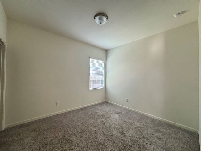 Carpeted empty room with baseboards | Image 6