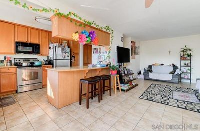 163 - Fredricks Ave, Condo with 2 bedrooms, 2 bathrooms and 1 parking in Oceanside CA | Image 1