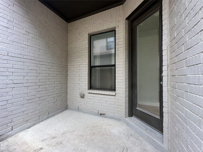 Doorway to property with brick siding | Image 28