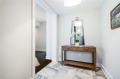 Entry with handsome marble tiled floor, not every apartment in this line has this beautiful foyer! | Image 2