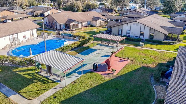 Community Pool & Shuffleboard Area | Image 44