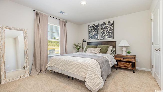 Bedroom with light carpet | Image 19