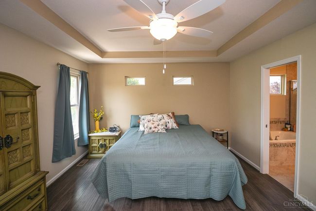 Primary Suite with adjoining Garden Bath. Tray ceiling with fan/light combo. Cork engineered flooring. | Image 6