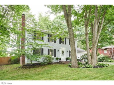 Colonial home with a front yard | Image 1