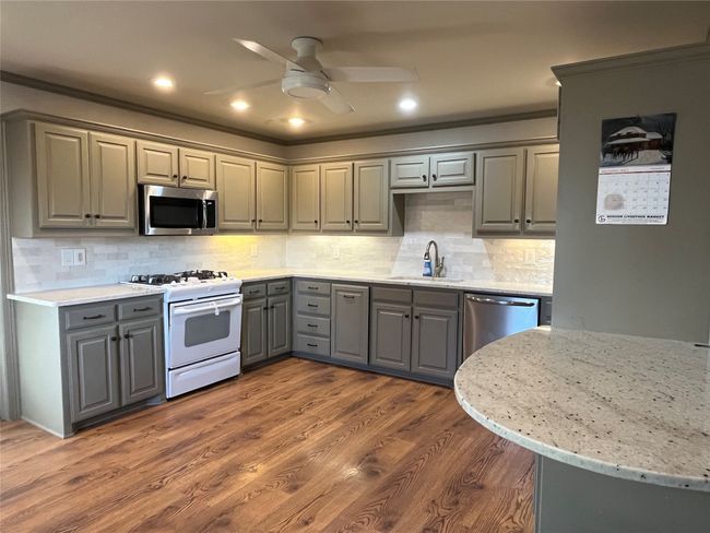 Plenty of Countertops and Cabinetry for Mealtime and Entertaining | Image 5